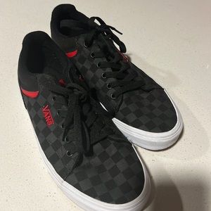Vans Black and red tennis shoes. Size 9. Worn only a few times